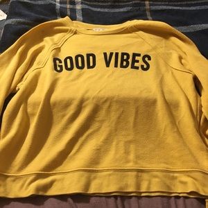Yellow “good vibes” sweater